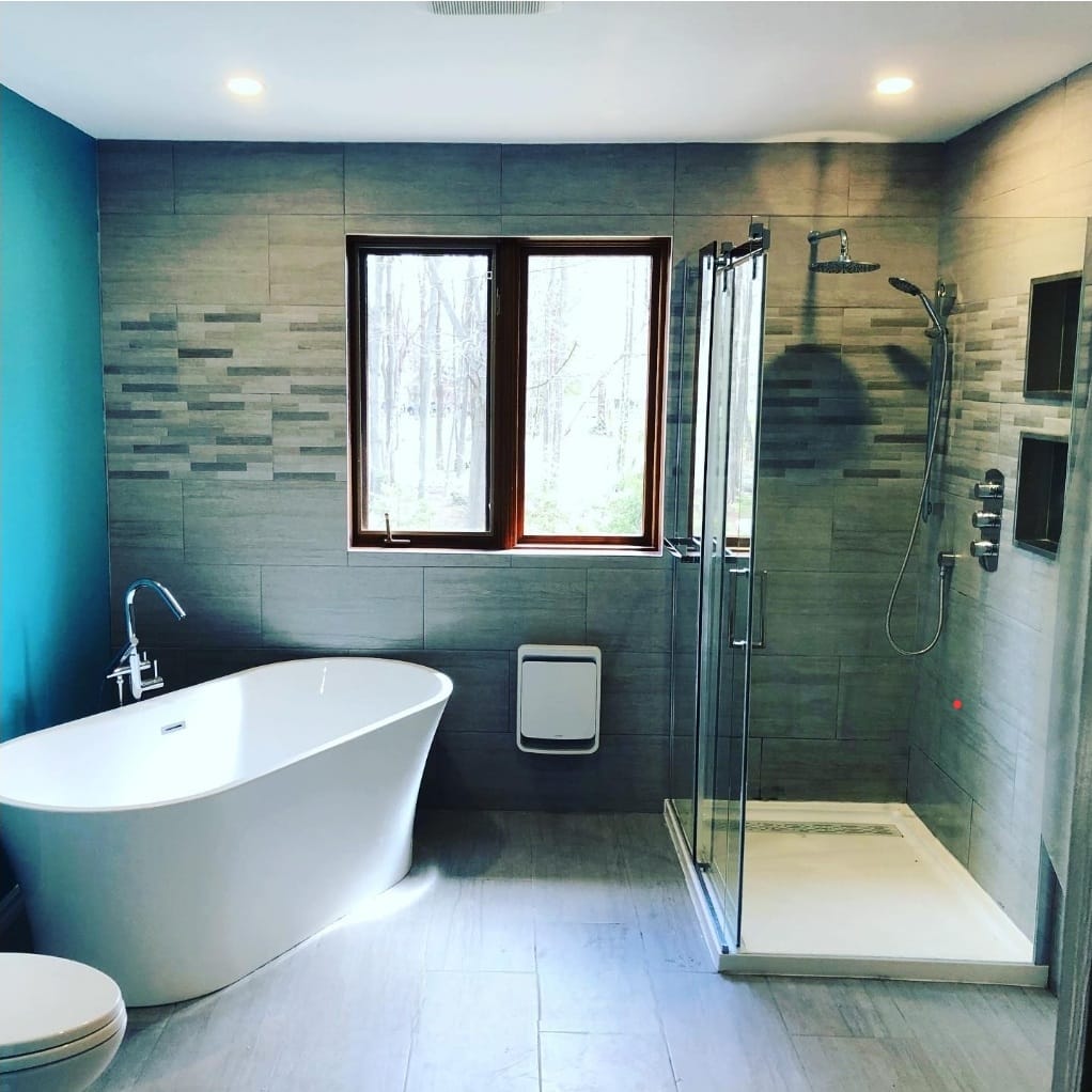 Freestanding tub and glass walk-in shower renovation by ZEM RENO